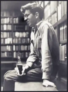 Larry McMurtry in profile, looking thoughtfully into the distance.